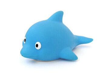 Baby bath toy dolphin isolated on white background .