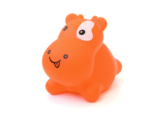 Children's rubber toy dog isolated on white background