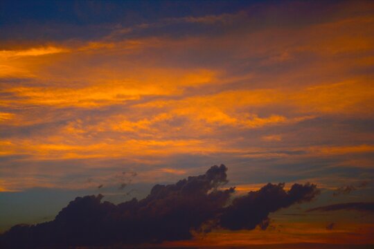 impression clouds. from golden hour sky. texture background with copy space. Vivid tone・soft focus image.