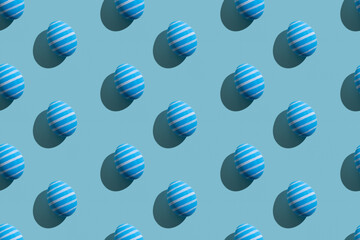 Easter seamless pattern. Festive decor. Holiday art. Abstract background. Blue painted paschal eggs with white lines ornament isolated on pastel textured.