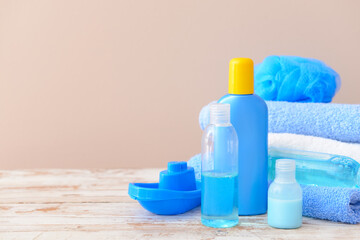 Bath accessories for children on color background