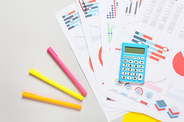 Obraz premium Modern calculator and documents on grey background