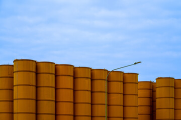 Yellow Construction Silos against blue sky