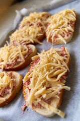 homemade open faced hot sandwiches with sausage and cheese