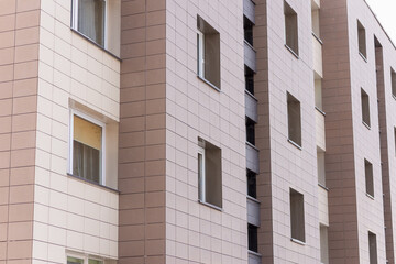 Fragment residential apartment with flat building exterior. Detail of New luxury house and home complex.