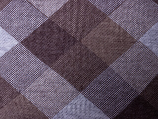 Knitted fabric with a pattern of squares