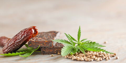Chocolate protein bar with hemp seeds and dates. Healthy vegan food