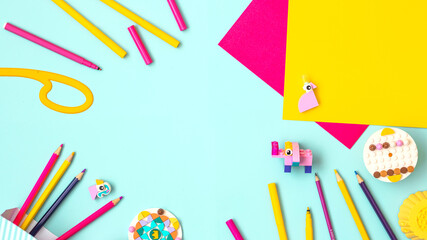 Children art concept colorful flat lay.Work kids desk with craft supplies top view. Children education themed photo.