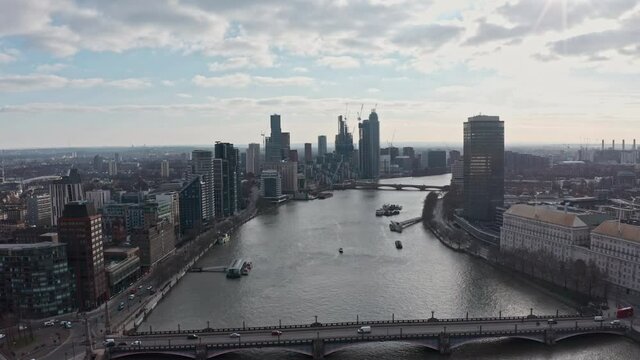 Aerial drone shot towards Vauxhall over river thames from Westminster