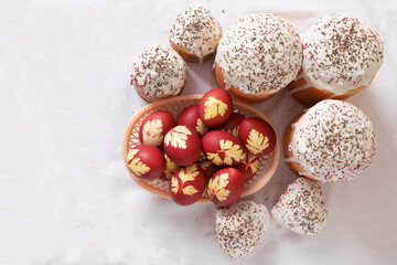 Orthodox Easter. Easter cakes and colored eggs on table. Traditional Kulich, Paska Easter Bread. Top view