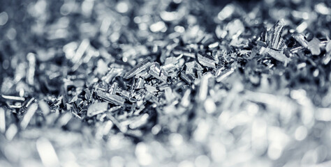 Banner Macro photo of iron metal shavings after CNC drilling lathe machine, Industrial background - obrazy, fototapety, plakaty