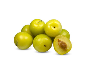 plums pile green yellow isolated on white background with clipping​ path​