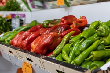 Red and green peppers in a greengrocer's shop