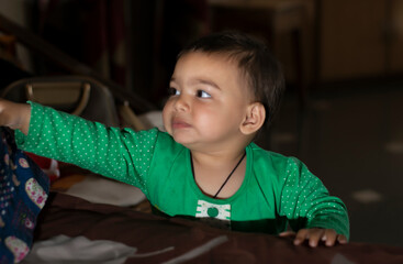 Asian Indian baby girl portrait closeup. A cute baby girl with beautiful