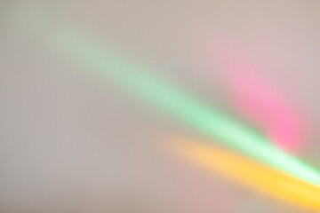 Rainbow light background. Gradient color texture. Festive art surface. Colorful pink yellow green...