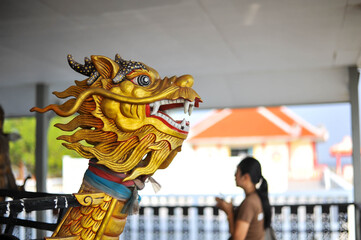 Fototapeta na wymiar Head of Gold Dragon sculpture at Wat Khun Samut Chin temple, Samut Prakan province, Thailand