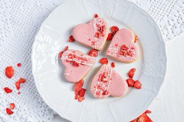 pink wedding valentine love cake in a heart shape pink dessert with freeze dried strawberries