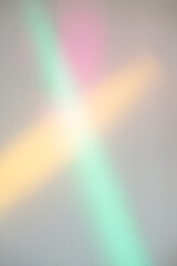 Rainbow lights. Abstract background. Gradient surface. Art poster. Colorful pink yellow green blur glowing rays overlay on neutral wall. - obrazy, fototapety, plakaty