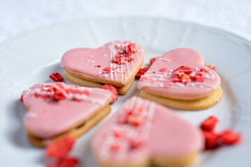 pink wedding valentine love cake in a heart shape pink dessert with freeze dried strawberries