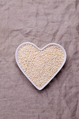 Dry pearl barley in a ceramic dish