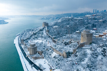 Aerial view of Rumeli Hisarı Castle and the Bosphorus on a snowy day, İstanbul.