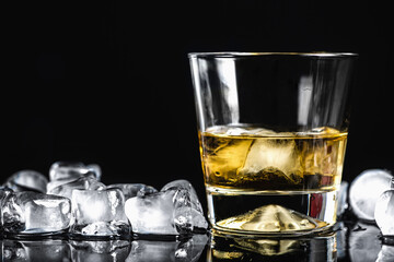 Scotch in a Glass with Ice Cubes, Black Background