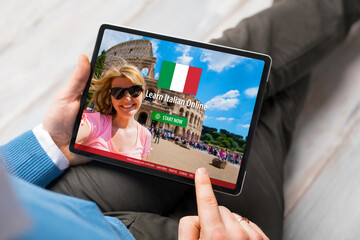 Man taking online courses and learning Italian language