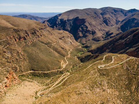 Aerial view of Swartberg Pass on the R328 run through the Swartberg mountain range on northern edge of the semi-arid Karoo, Western Cape, South Africa