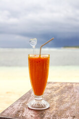 An exotic drink on the beach. Tonic dessert from the beach bar.