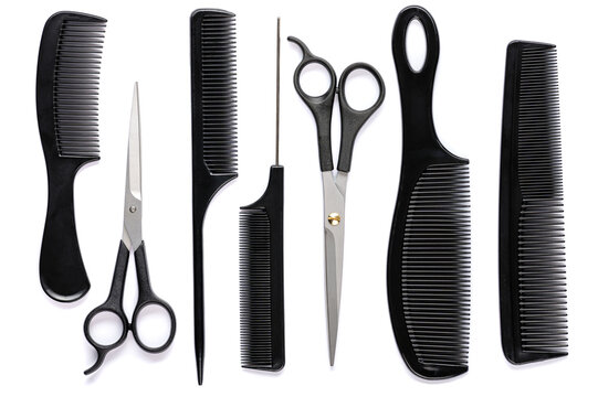 black hair combs of various types and scissors for cutting hair on a white isolated background