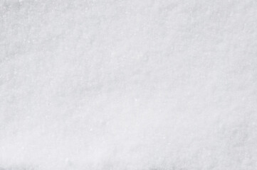 Background, texture of winter white fresh snow. Photo, top view.