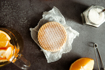 Viennese waffles on a black background. sweet table concept. Sweets for tea.