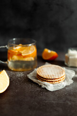 Viennese waffles on a black background. sweet table concept. Sweets for tea.