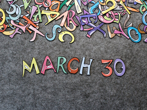 March 30 Calendar Keywords Hand-drawn colorful puzzle with grey furry background top view good for thumbnails