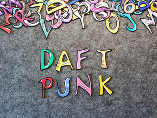Daft Punk Keywords Hand-drawn colorful puzzle with grey furry background top view good for thumbnails