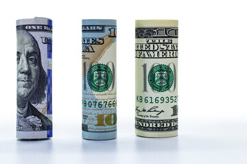 One hundred dollar banknote rolled into a tube. Close-up. Isolated white background. Concept for...