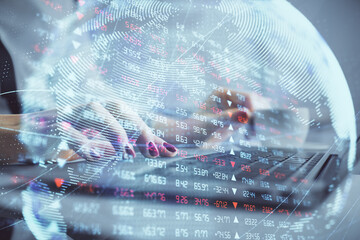 Multi exposure of woman hands typing on computer and business theme hologram drawing. Success...