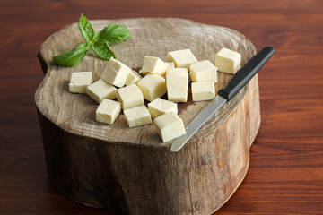 Matar Paneer curry, paneer butter masala recipe made using cottage cheese, green peas, served in a bowl.  Delhi, Rajasthan India. Indian veg curry wooden background. side dish of Roti, Chapati, naan