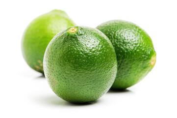 Fresh limes on white background
