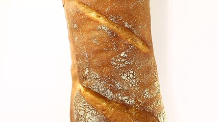 French baguette loaf rotation, turning counterclockwise, on white background, top view. - Powered by Adobe