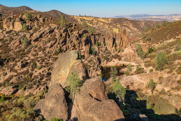 Rock formations in Pinnacles National Park in California, the destroyed remains of an extinct volcano on the San Andreas Fault. Beautiful landscapes, cozy hiking trails for tourists and travelers.