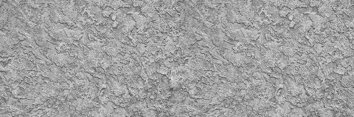 grey corrugated surface. Venetian style plaster. light creative background.rough uneven texture