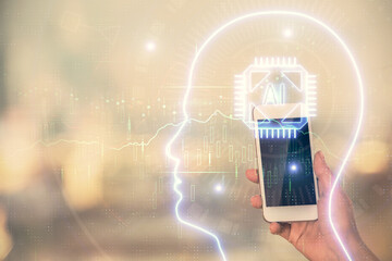 Double exposure of brain sketch hologram and woman holding and using a mobile device.