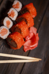 sushi rolls wooden sticks seafood filling delicacy asian food