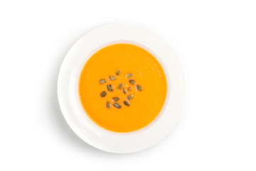 Autumn pumpkin cream soup with seeds is healthy organic vegetarian food