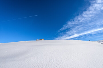 Old farmhouse on the Lessinia Plateau in winter with snow. (Altopiano della Lessinia), Regional Natural Park, Malga Gaibana near Malga San Giorgio ski resort, Verona Province, Veneto, Italy, Europe.