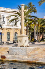 Urban view with a monument in Cartagena, Murcia, Spain