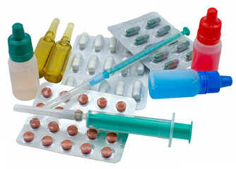 Medical pills, syringe and plastic bottles isolated on white