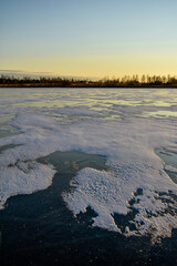 the first ice on the sun at sunset