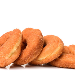 a pile of rosquillas, typical spanish donuts on white background